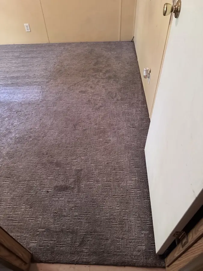 Before: Traffic lane on patterned carpet